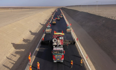 青海格茫公路擴建工程瀝青路面全線貫通